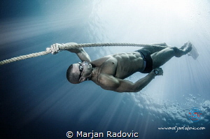 Freediver - Domagoj Jakovac - world champ under Ice diving by Marjan Radovic 